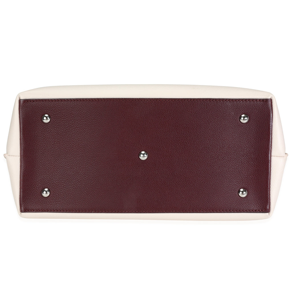 Louis Vuitton Louis Vuitton Cream & Burgundy Grained Calf Leather Lockme Day Bag
