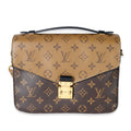Louis Vuitton Louis Vuitton Monogram Reverse Canvas Pochette Métis