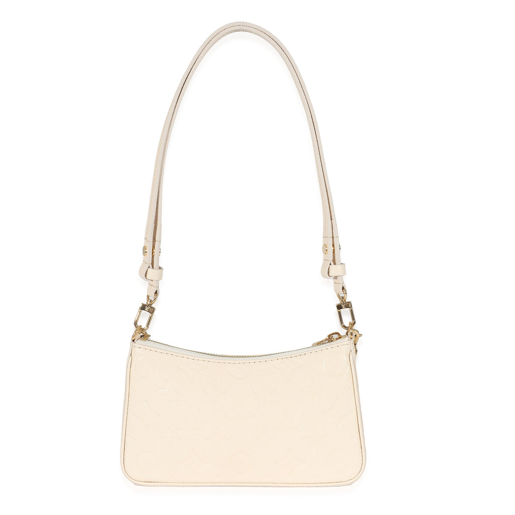 Louis Vuitton Louis Vuitton Cream Monogram Empreinte Easy Pouch On Strap