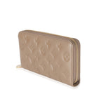 Louis Vuitton Louis Vuitton Taupe Monogram Embossed Lambskin Coussin Zippy Wallet
