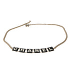 Chanel 2022 Black & White Enamel Gold Plated Logo Belt