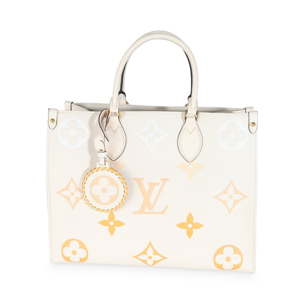 Louis Vuitton Cream Saffron Giant Monogram Empreinte Onthego MM