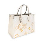 Louis Vuitton Cream Saffron Giant Monogram Empreinte Onthego MM