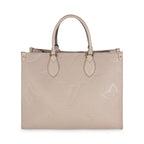 Louis Vuitton Tourterelle Giant Monogram Empreinte Onthego MM