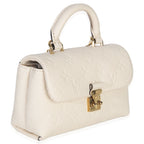 Louis Vuitton Cream Monogram Empreinte Nano Madeleine