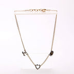 Chanel Crystal Eye Heart CC Necklace