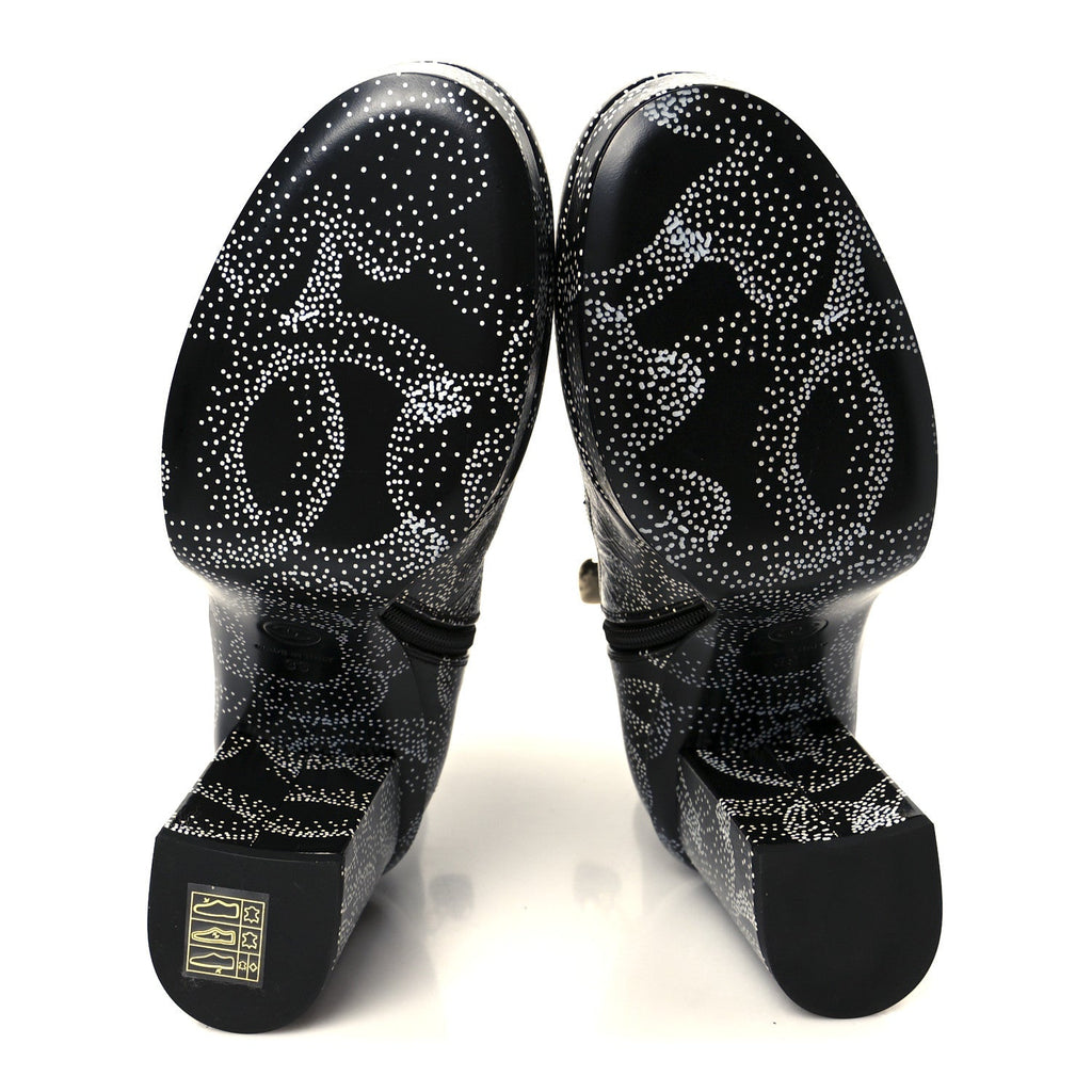 Chanel Calfskin Camellia Printed Ankle Boots 39 Black White