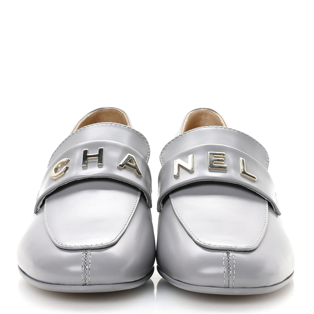 Chanel Shiny Calfskin Logo Loafers 37 Light Grey