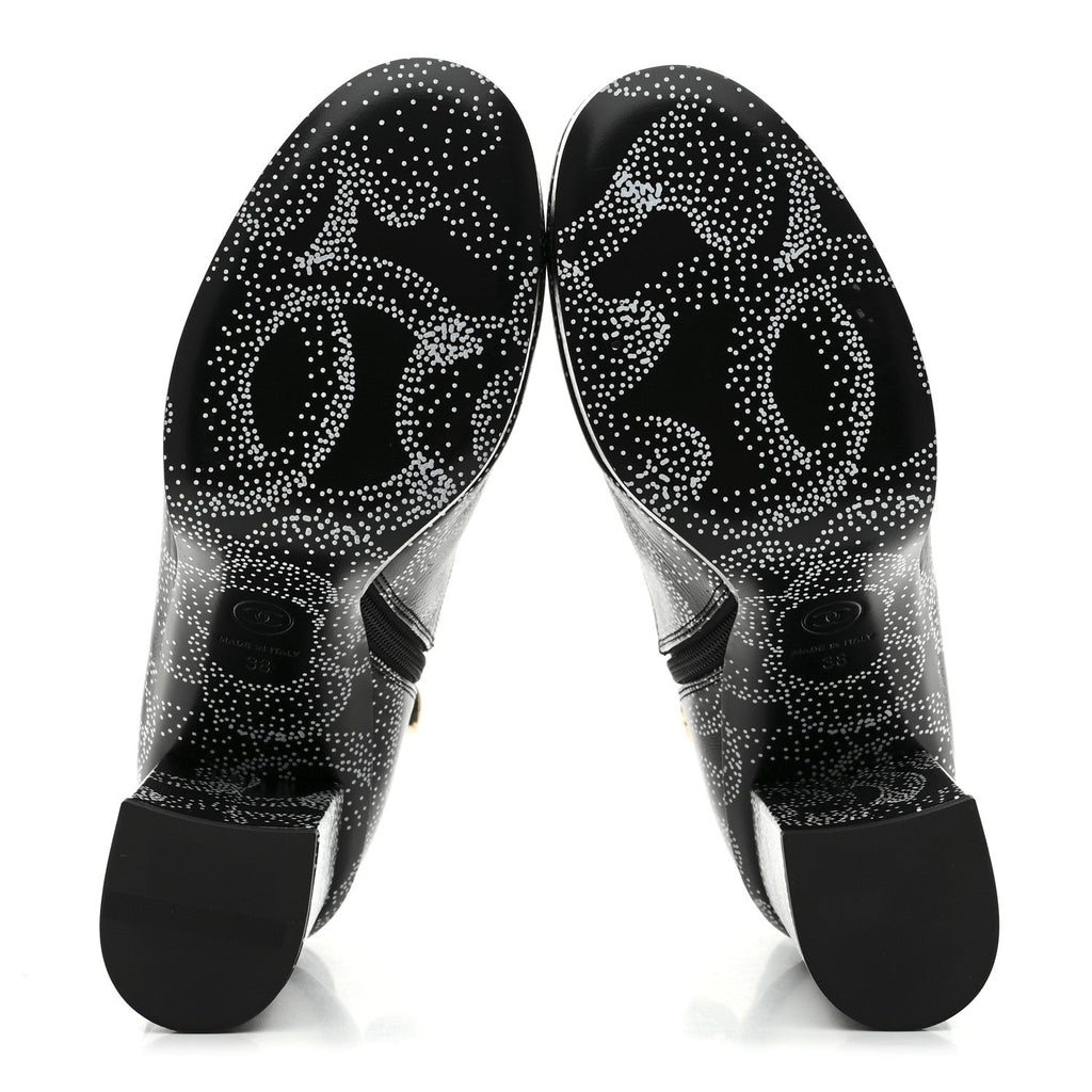 Chanel Calfskin Camellia Printed Ankle Boots 38 Black White