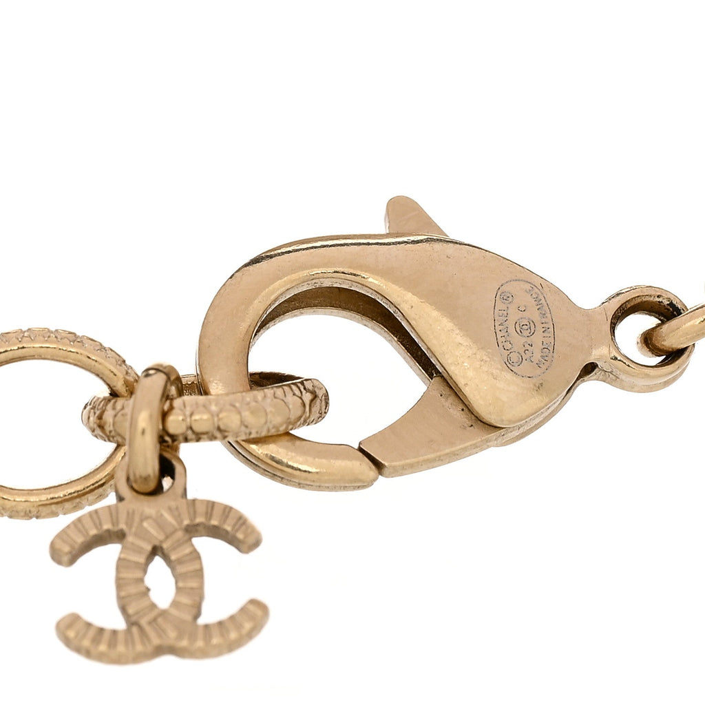 Chanel Metal Glass Pearl Strass CC Pendant Bracelet Gold Black