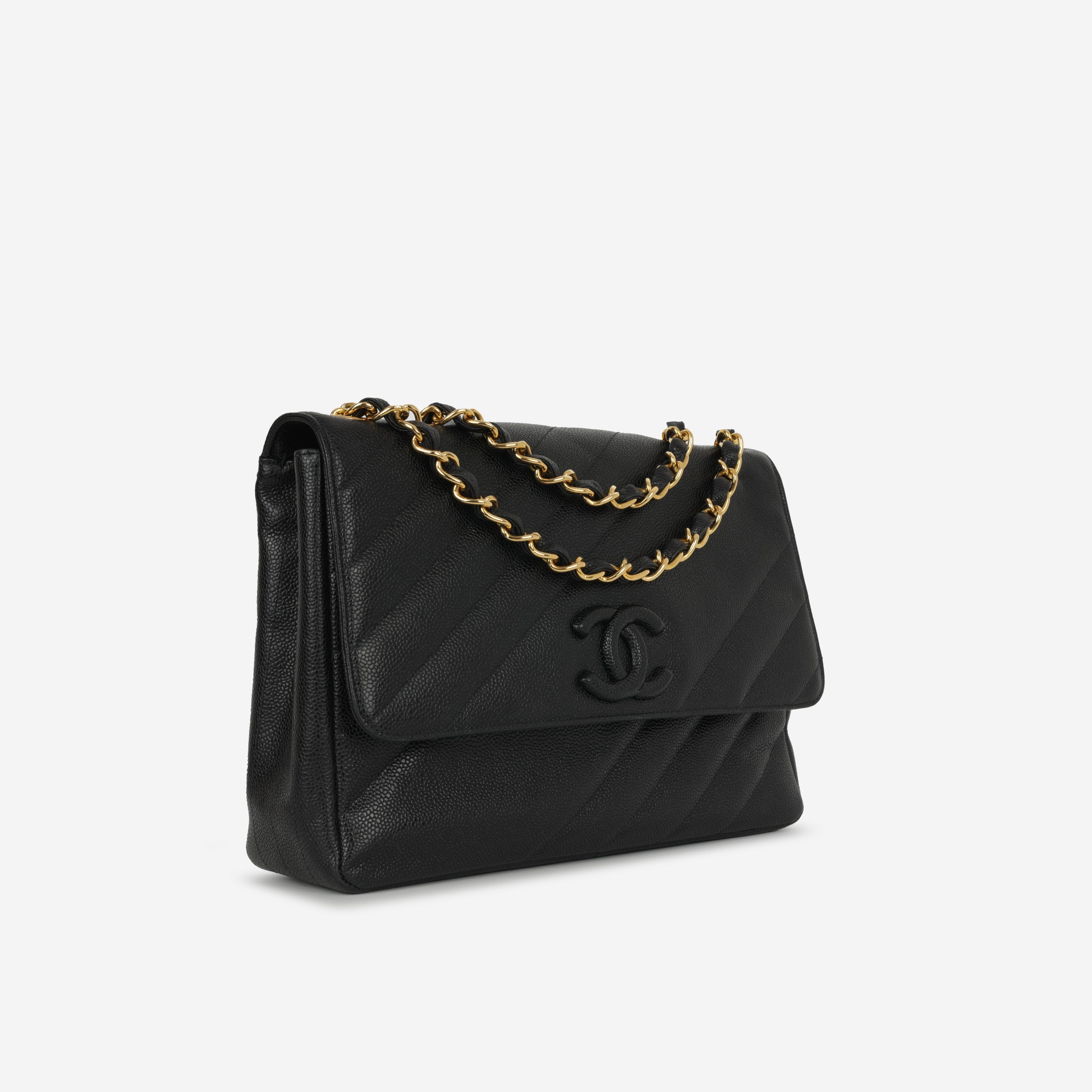 Chanel Vintage Jumbo Diagonal Flap - Black Caviar | Gold Hardware