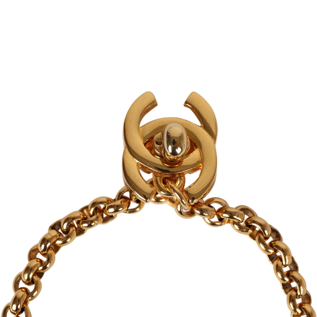 Vintage Chanel 24K Gold Plated "Chanel" Logo Charms Turnlock Bracelet