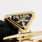 Prada hair clip gold metal