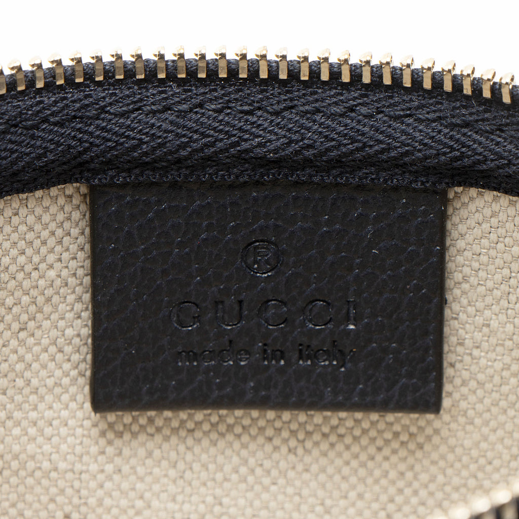 Gucci GG Denim Zip Pochette
