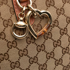 Gucci GG Canvas Heart Bit Satchel