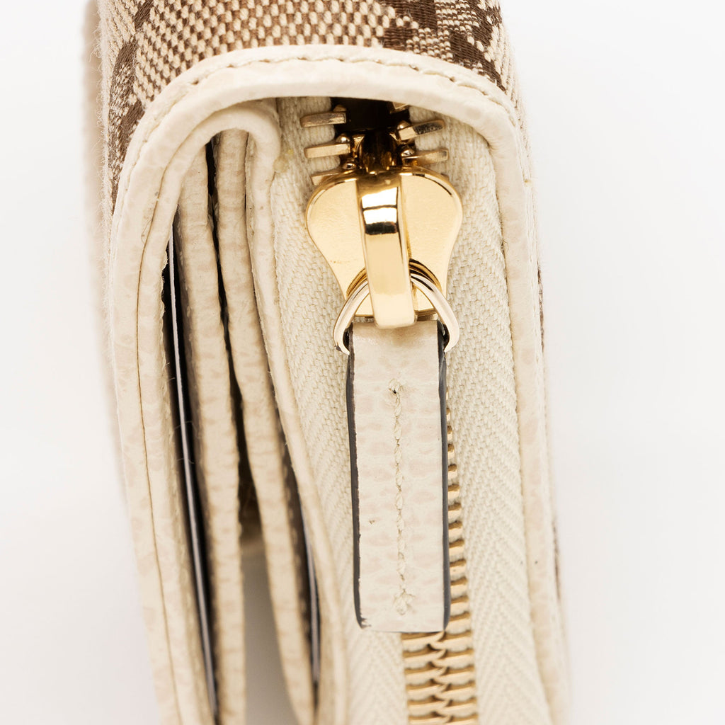 Gucci GG Canvas Zip Around Compact Wallet (SHF-p3f4tY)