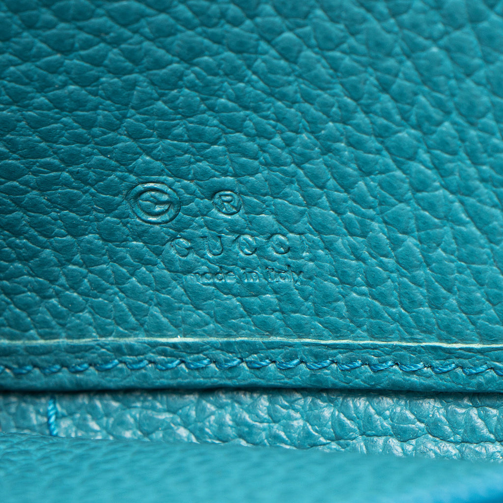 Gucci GG Canvas Zip Around Wallet