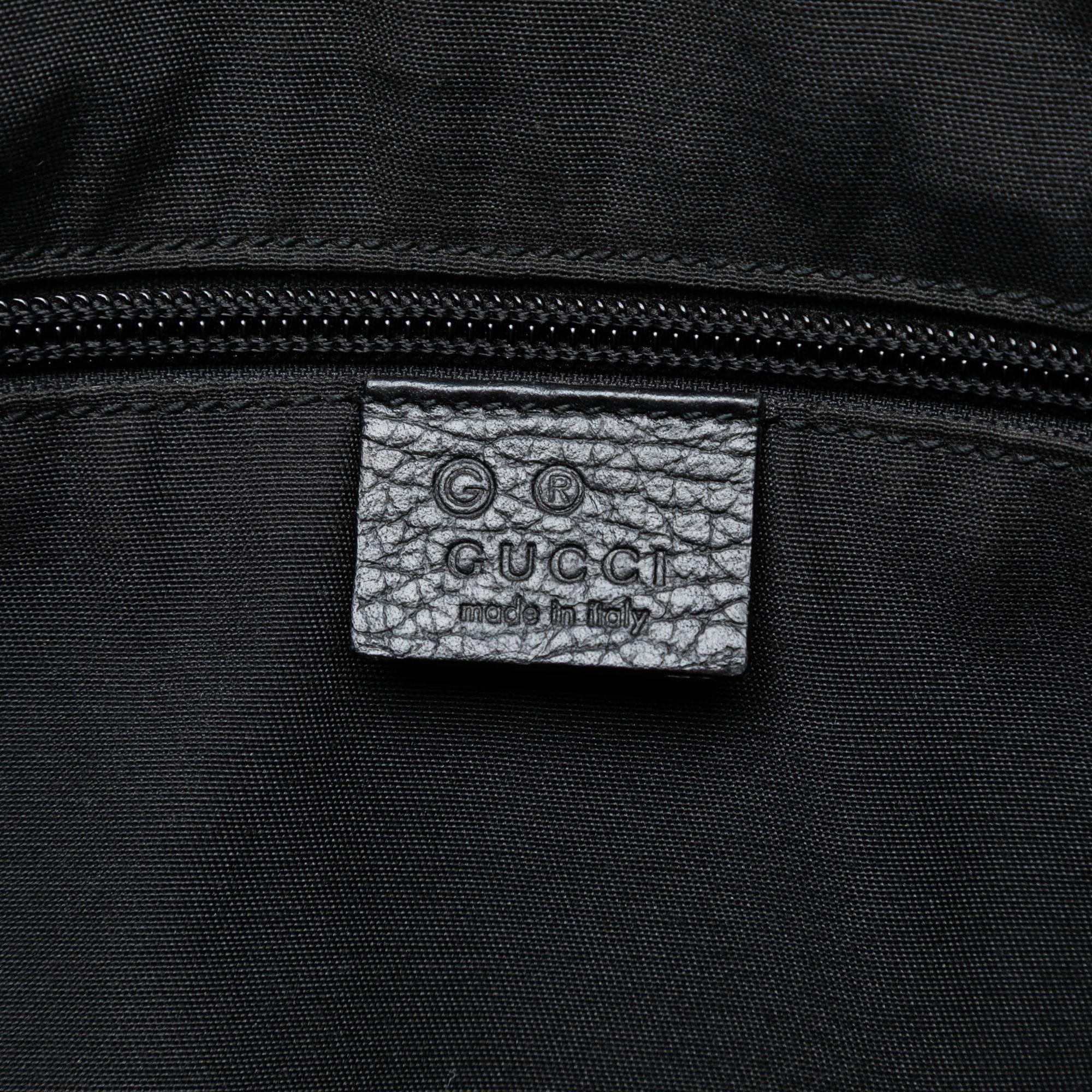 Gucci GG Denim Crossbody