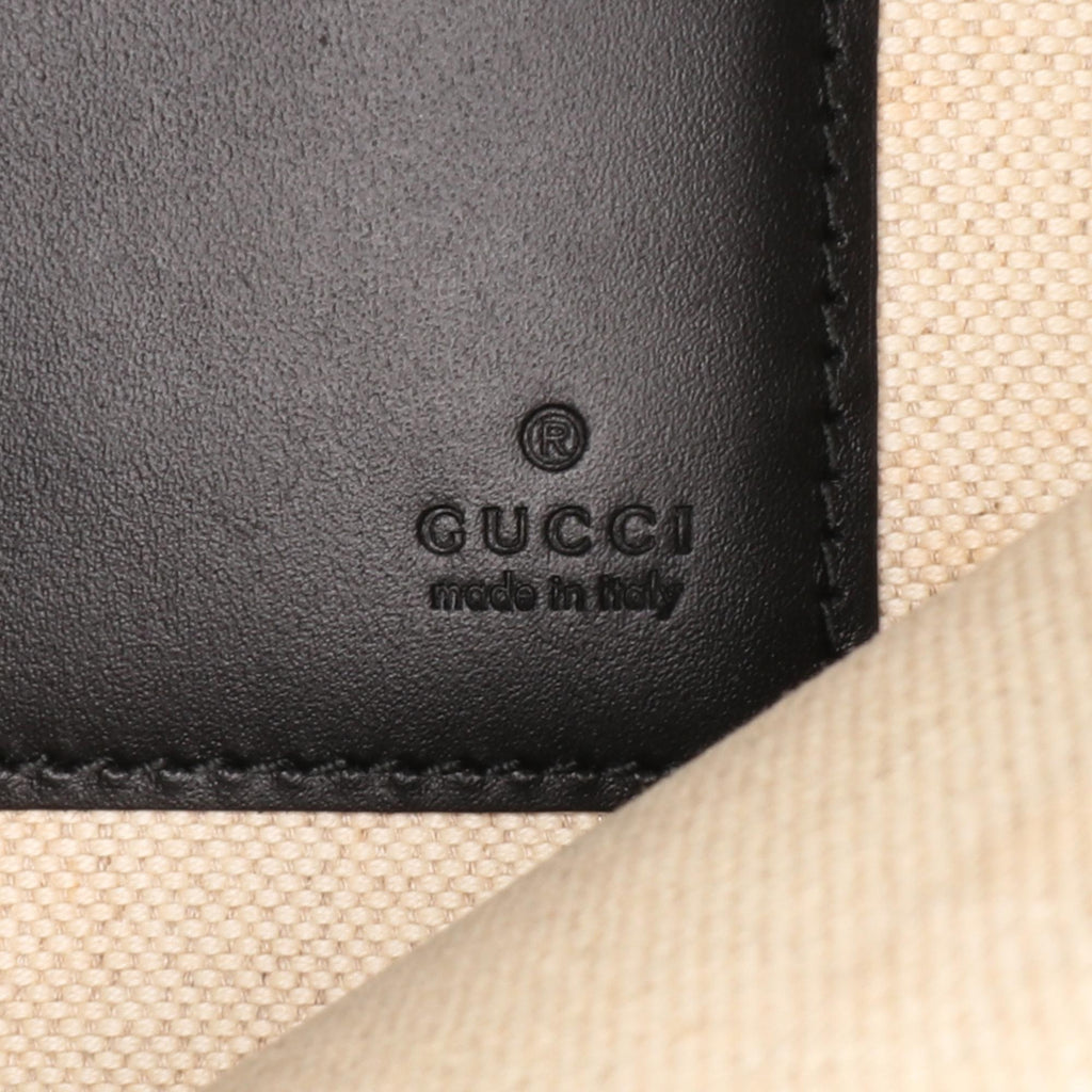 Gucci GG Supreme Tiger Clutch