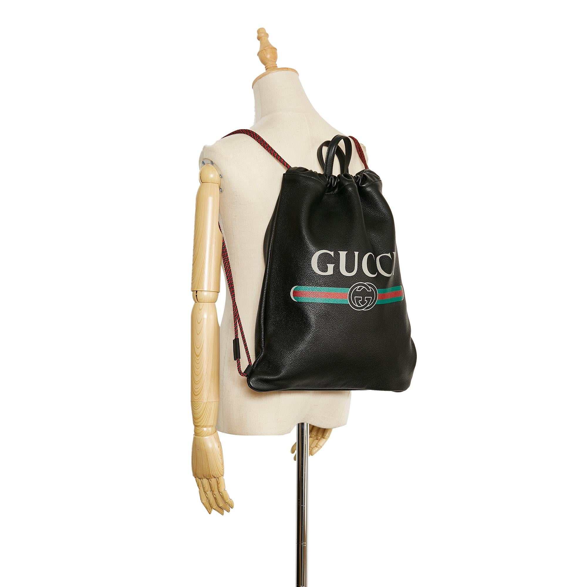 Gucci Gucci Logo Drawstring  Backpack (SHG-iZwaga)