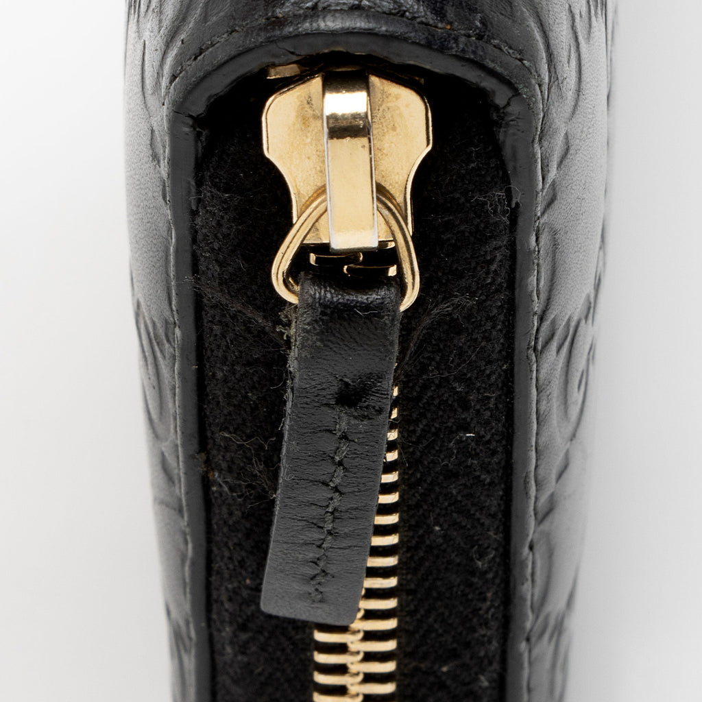 Gucci Guccissima Leather Bow Zip Around Wallet
