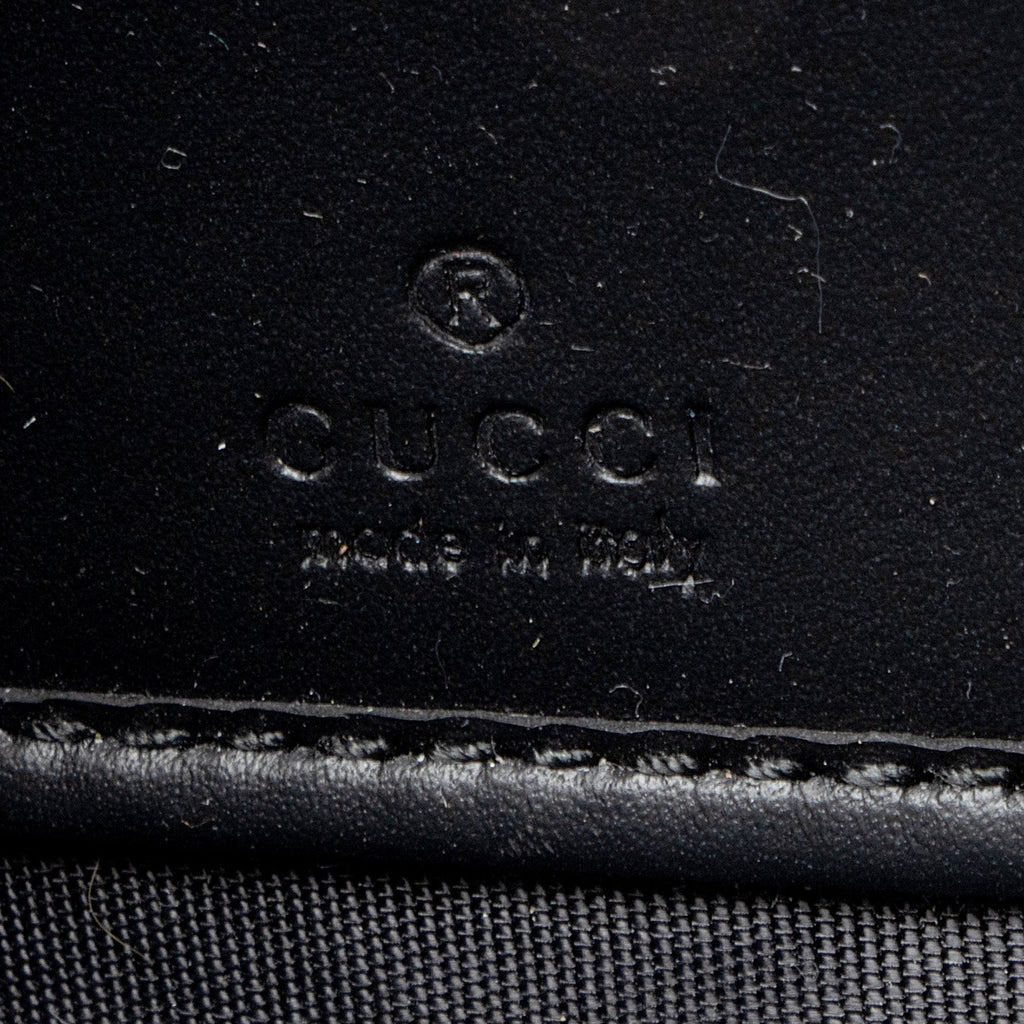 Gucci Guccissima Leather Bow Zip Around Wallet