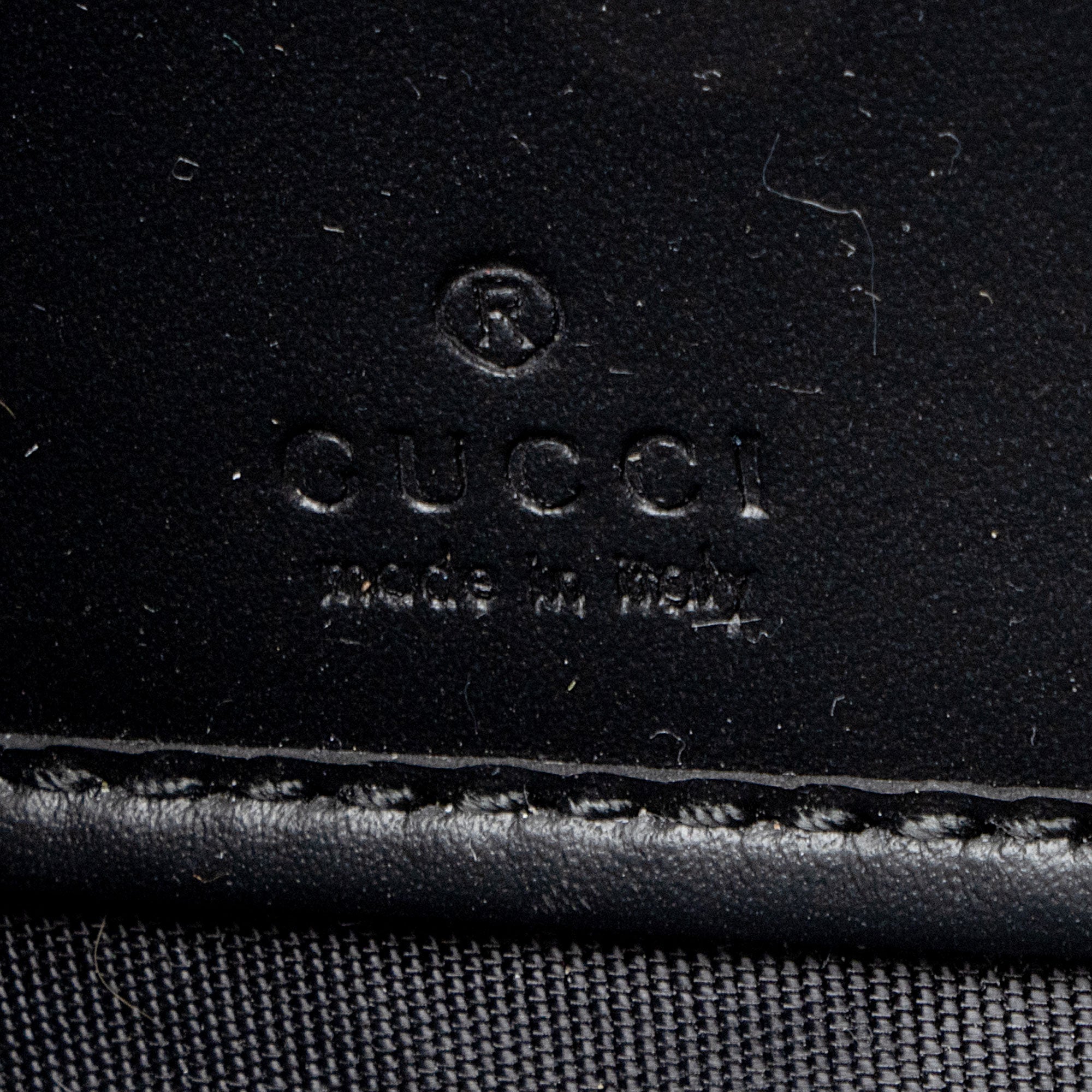 Gucci Guccissima Leather Bow Zip Around Wallet