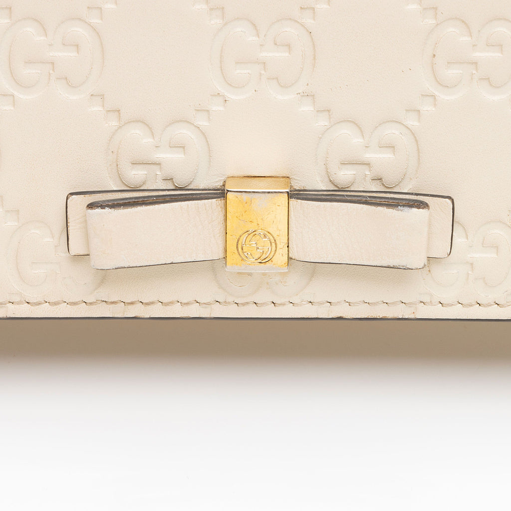 Gucci Guccissima Leather Signature Bow Mini Wallet on Chain