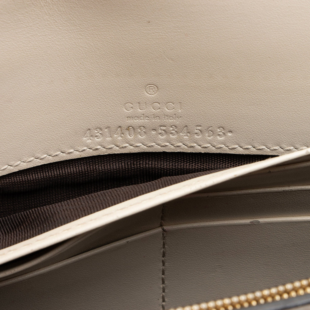 Gucci Guccissima Leather Signature Bow Mini Wallet on Chain