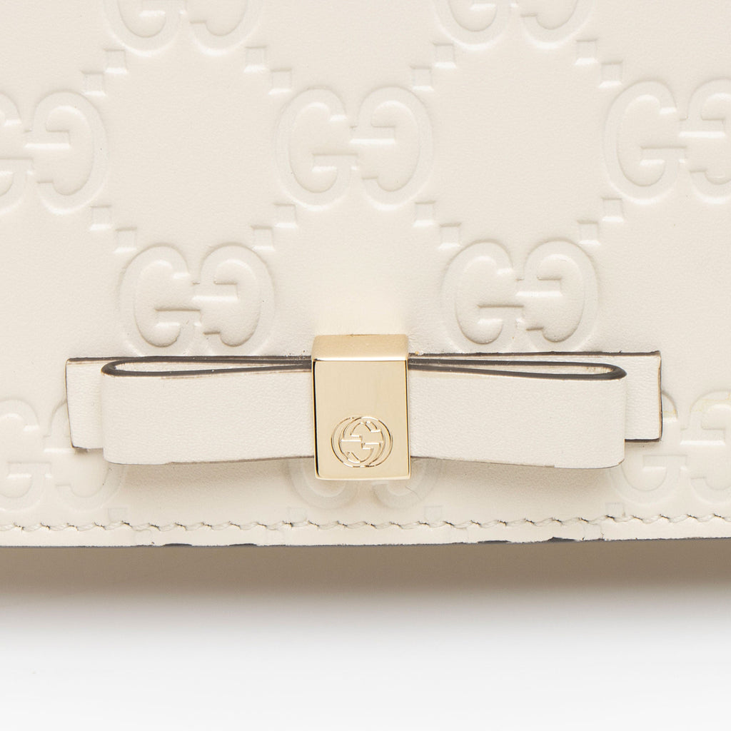 Gucci Guccissima Leather Signature Bow Mini Wallet on Chain
