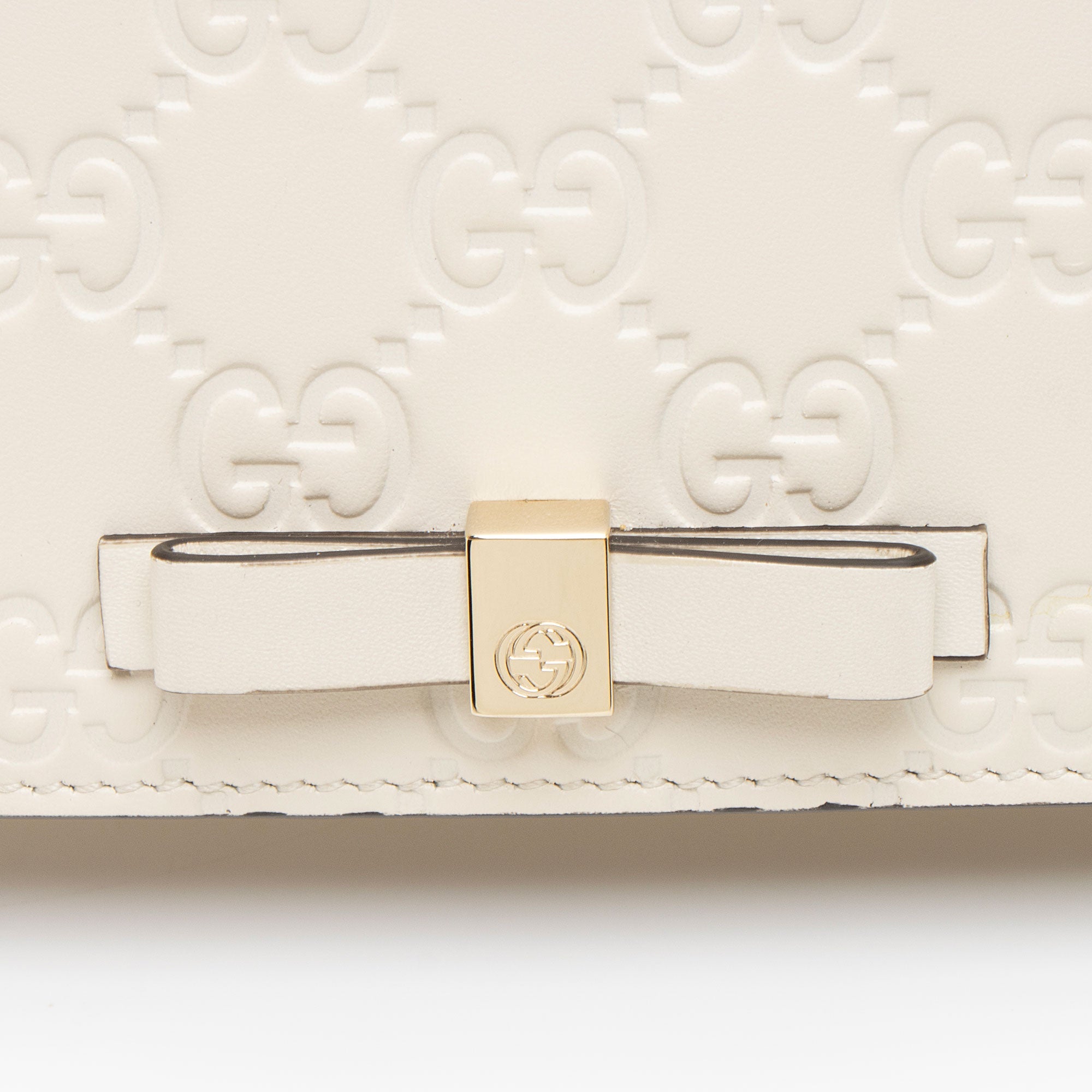 Gucci Guccissima Leather Signature Bow Mini Wallet on Chain