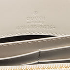 Gucci Guccissima Leather Signature Bow Mini Wallet on Chain