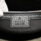 Gucci Jumbo GG Canvas Clutch on Strap
