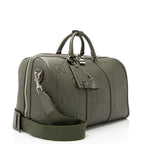 Gucci Jumbo GG Embossed Leather Small Duffle