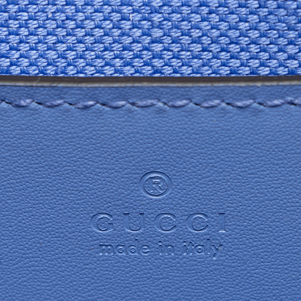 Gucci Jumbo GG Leather Mini Pochette