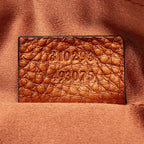 Gucci Metallic Leather Broadway Tassel Zip Clutch