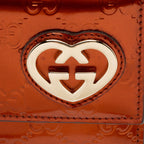 Gucci Metallic Patent Guccissima Leather Heart Logo Wallet (SHF-jwQhWg)