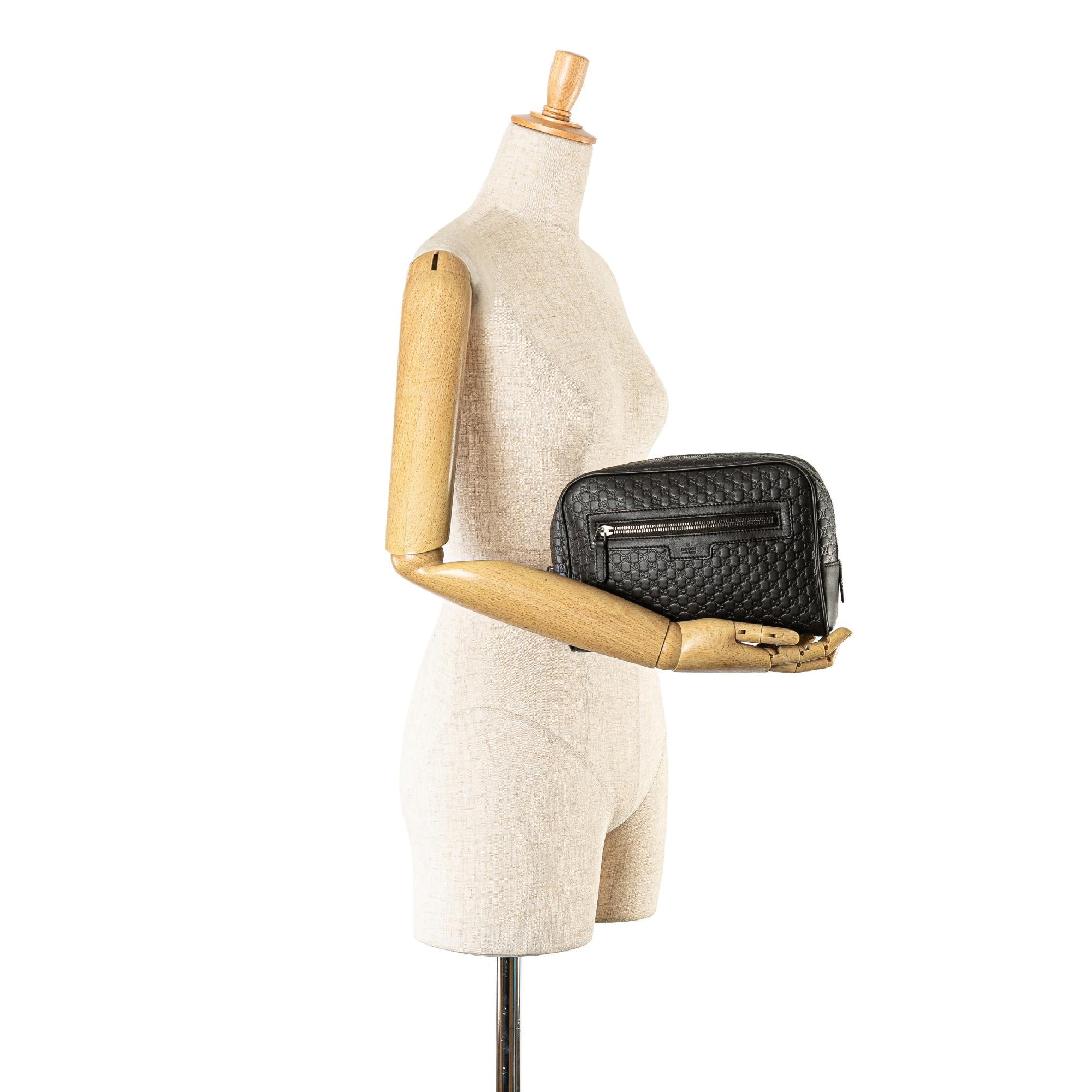 Gucci Microguccissima Clutch (SHG-nDHxQC)