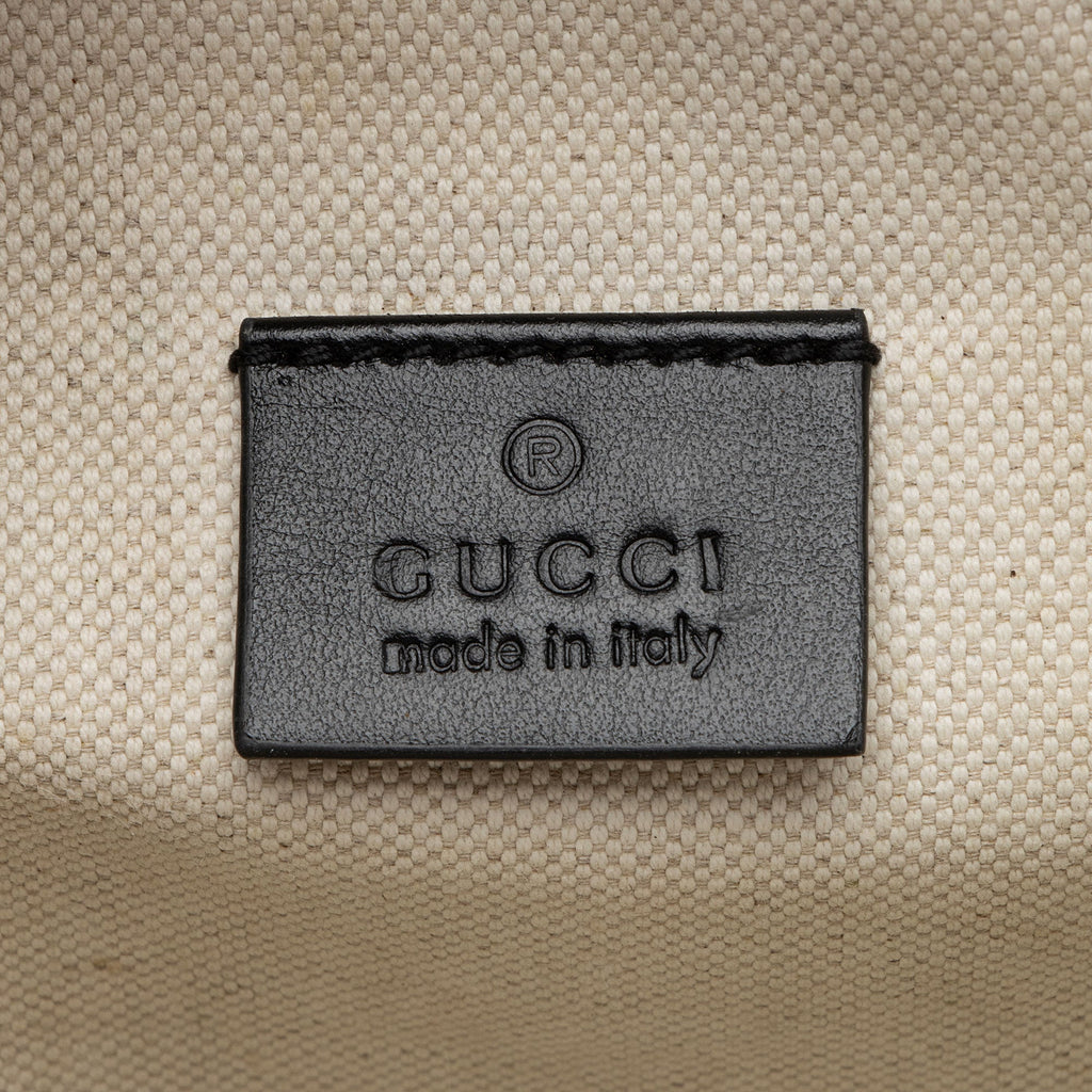 Gucci Perforated Embossed Leather GG Pocket Belt Bag (SHF-TJNqCI)