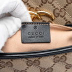 Gucci Small GG Marmont Matelasse Diagonal GG Canvas and Leather Shoulder Bag