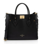 Louis Vuitton Calfskin Tufted Monogram Canvas On My Side MM Tote (SHF-WP5JFh)