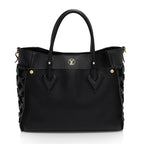 Louis Vuitton Calfskin Tufted Monogram Canvas On My Side MM Tote (SHF-QMhDUi)