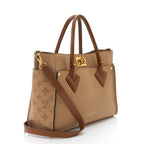 Louis Vuitton Mahina Calfskin On My Side MM Tote (SHF-C4Ei6m)