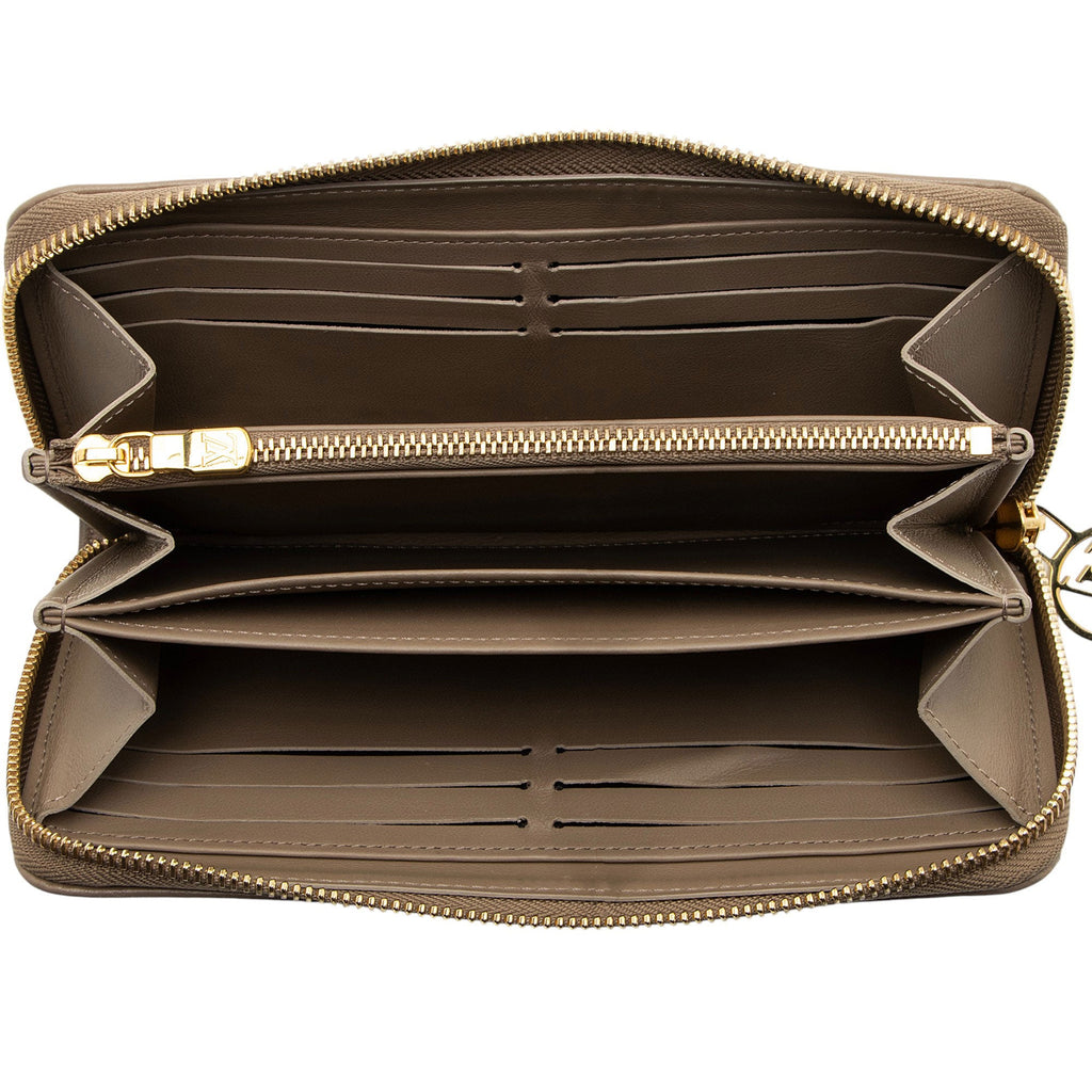 Louis Vuitton Monogram Embossed Lambskin Coussin Zippy Wallet
