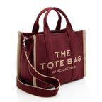 Marc Jacobs Canvas The Tote Medium Bag (SHF-j4utbg)